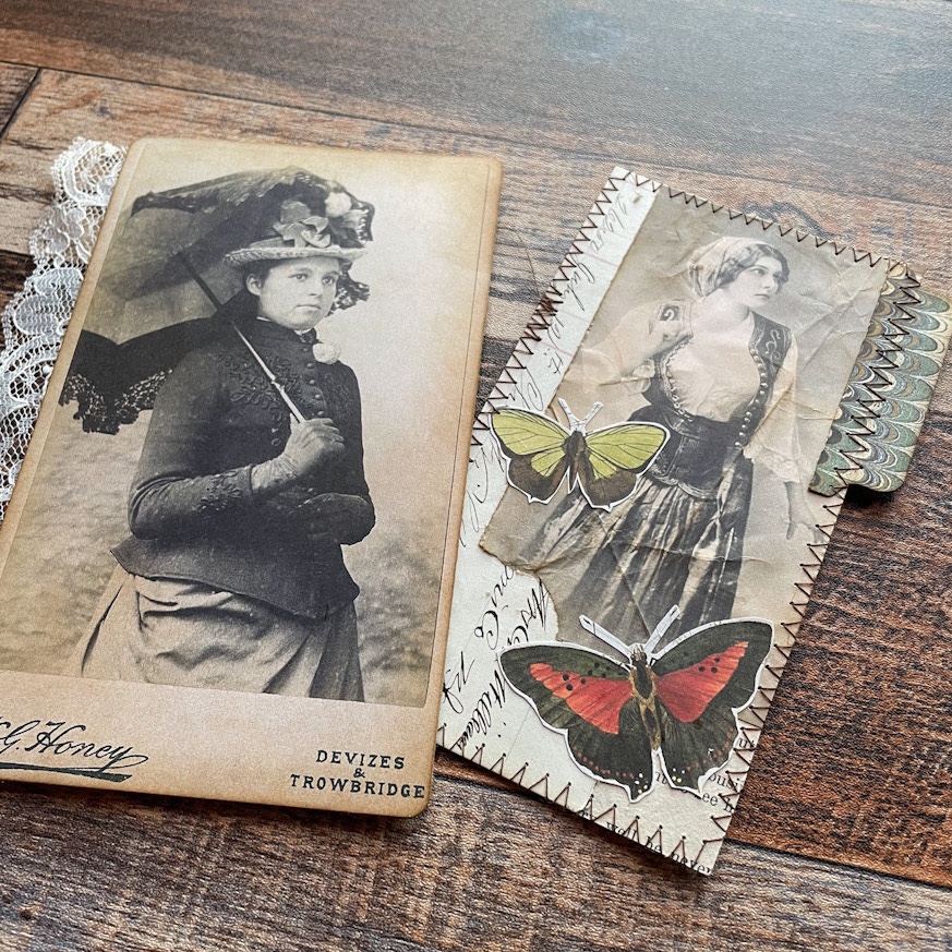 cabinet card with woman holding parasol and tag with a black and white gypsy lady and 2 butterflies